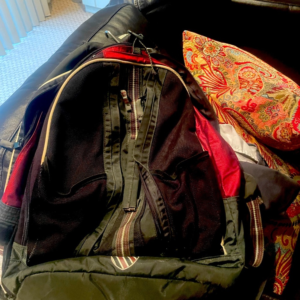 Tennis Backpack with seperate shoe storage and racket storage.